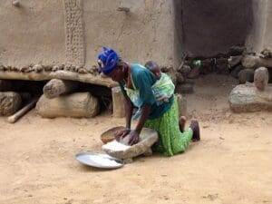 Woman grinding flour