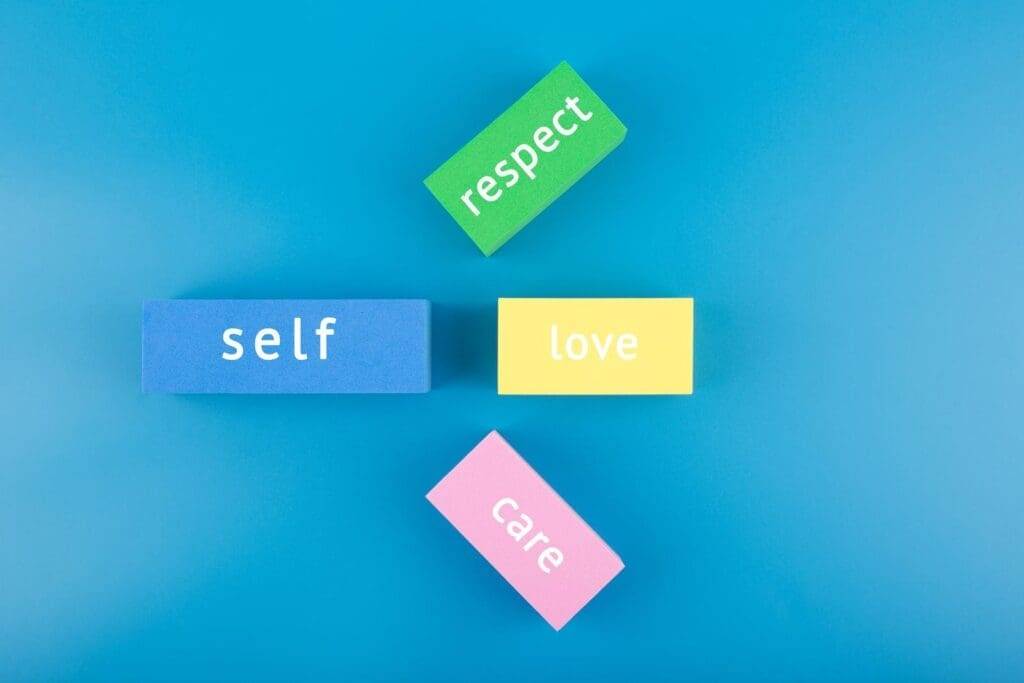 39861698 mental health formula concept self respect love and care written on multicolored rectangles on blue background