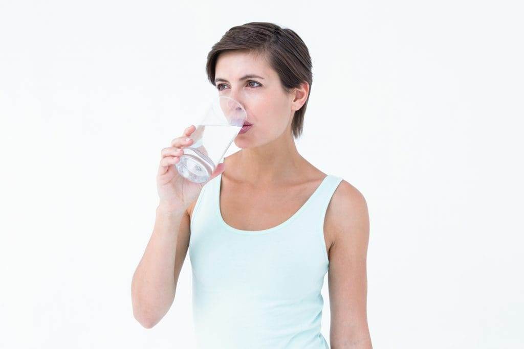 18200106 woman drinking glass of water